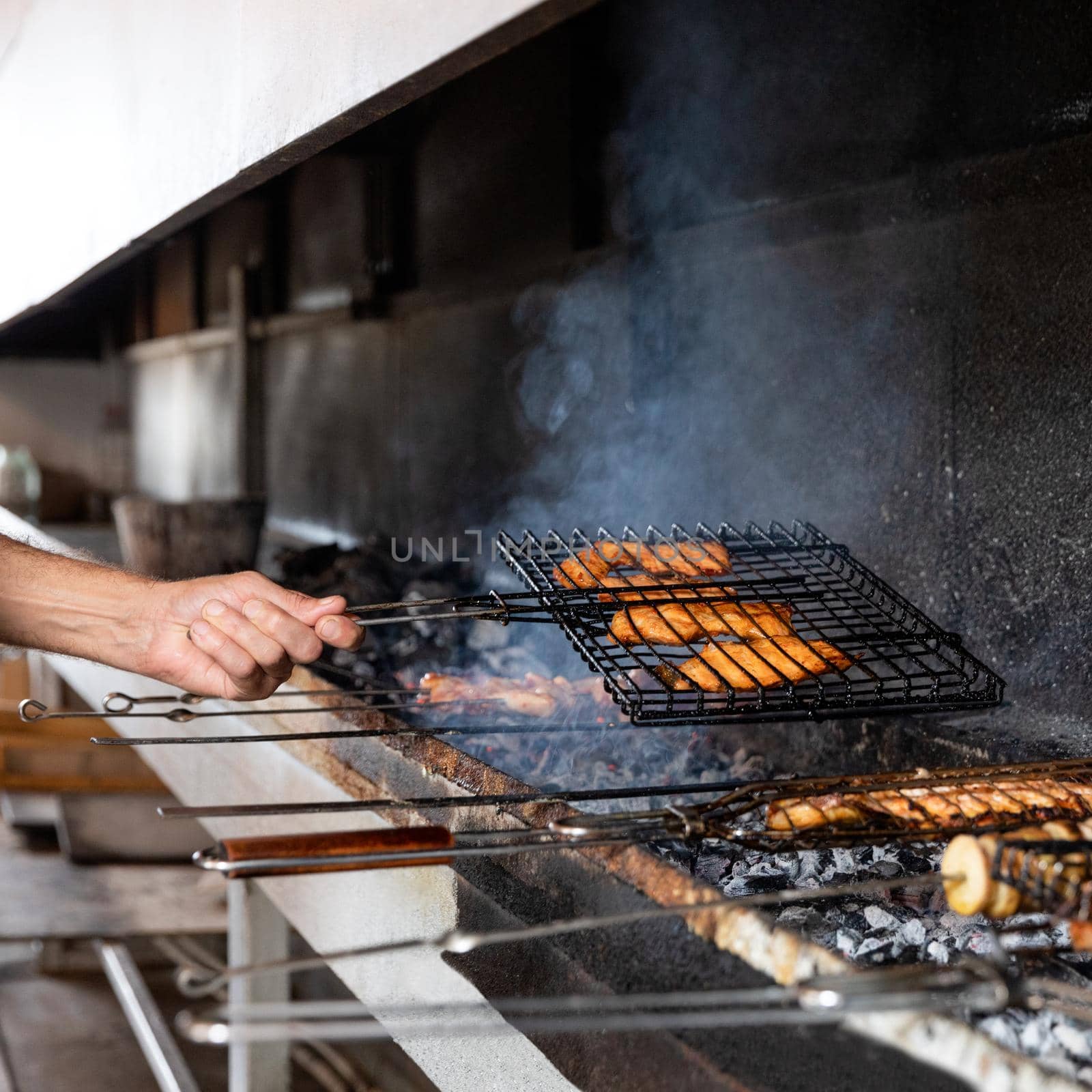 Frying fish meal, kebab in smoke by ferhad