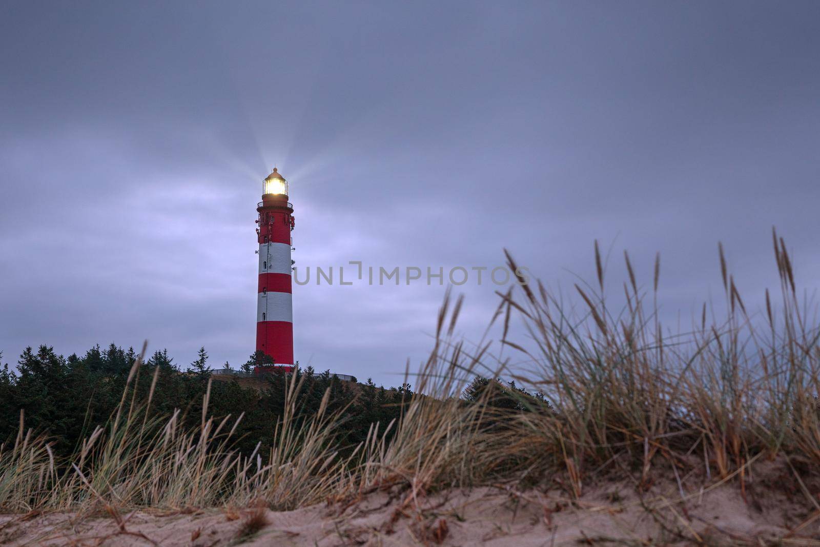 Panoramic image of the Wittduen lighthouse at daybreak, Amrum, Germany