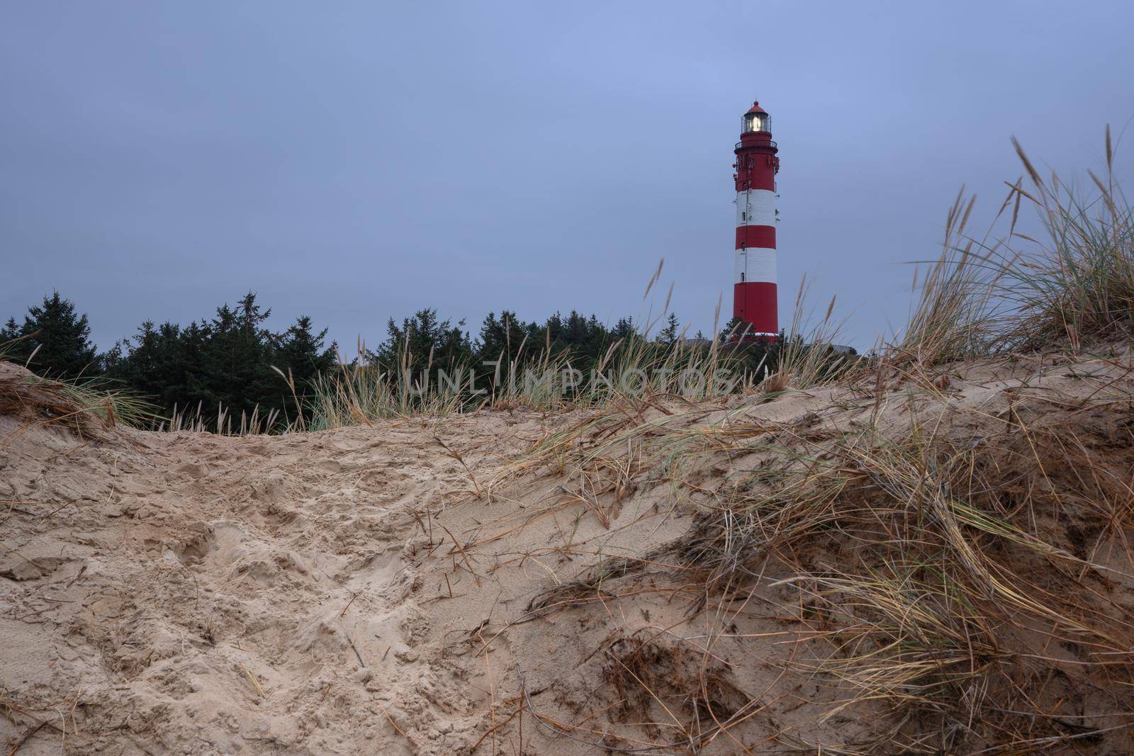 Panoramic image of the Wittduen lighthouse at daybreak, Amrum, Germany