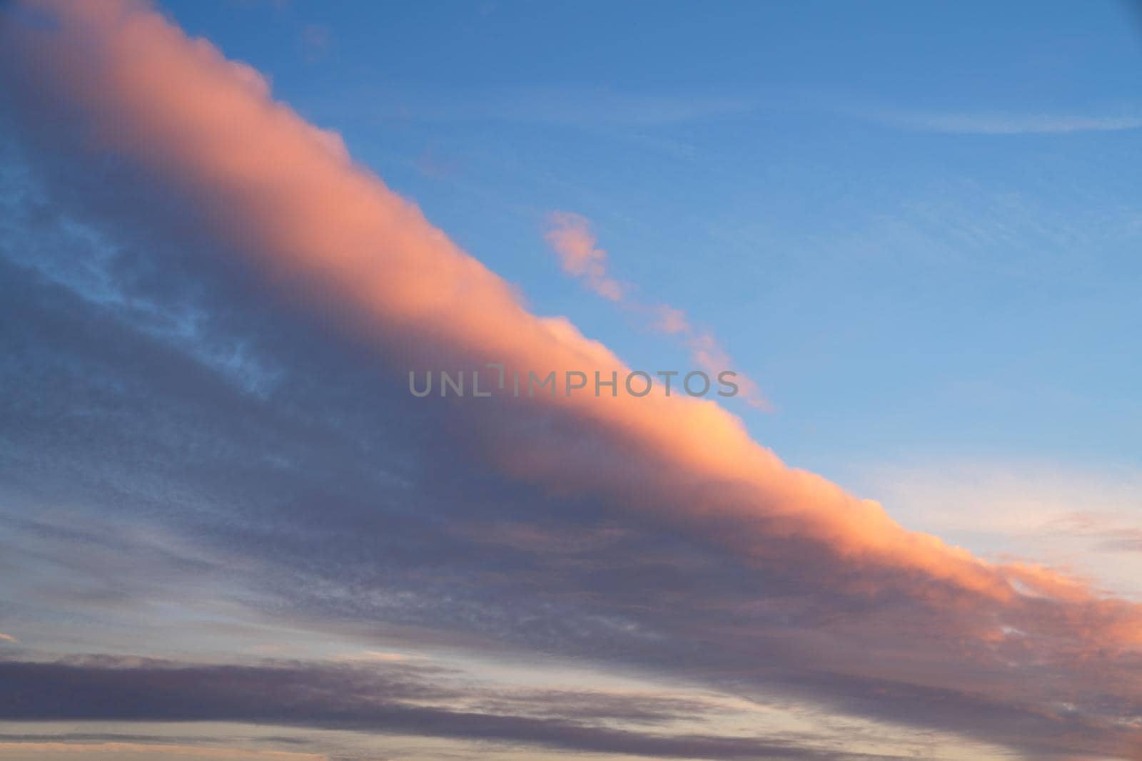 Early morning sky with pastel-colored clouds