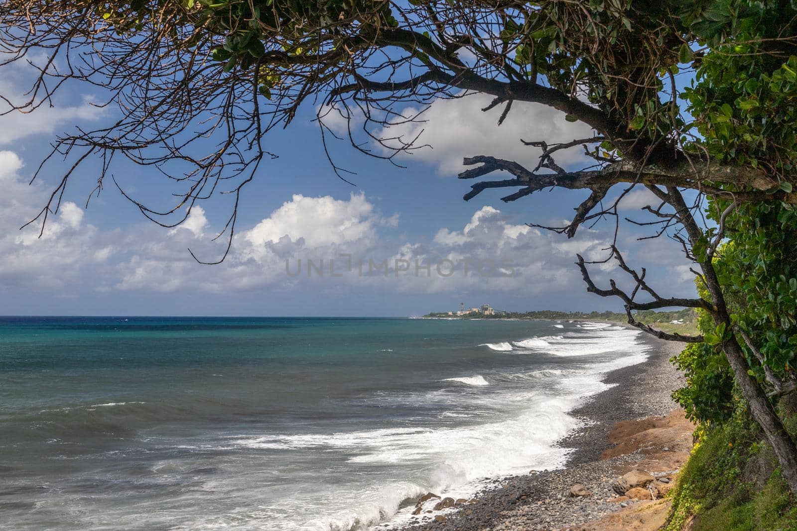 Pebble, gravel beach at Sainte Suzanne on Reunion island, France, by reinerc