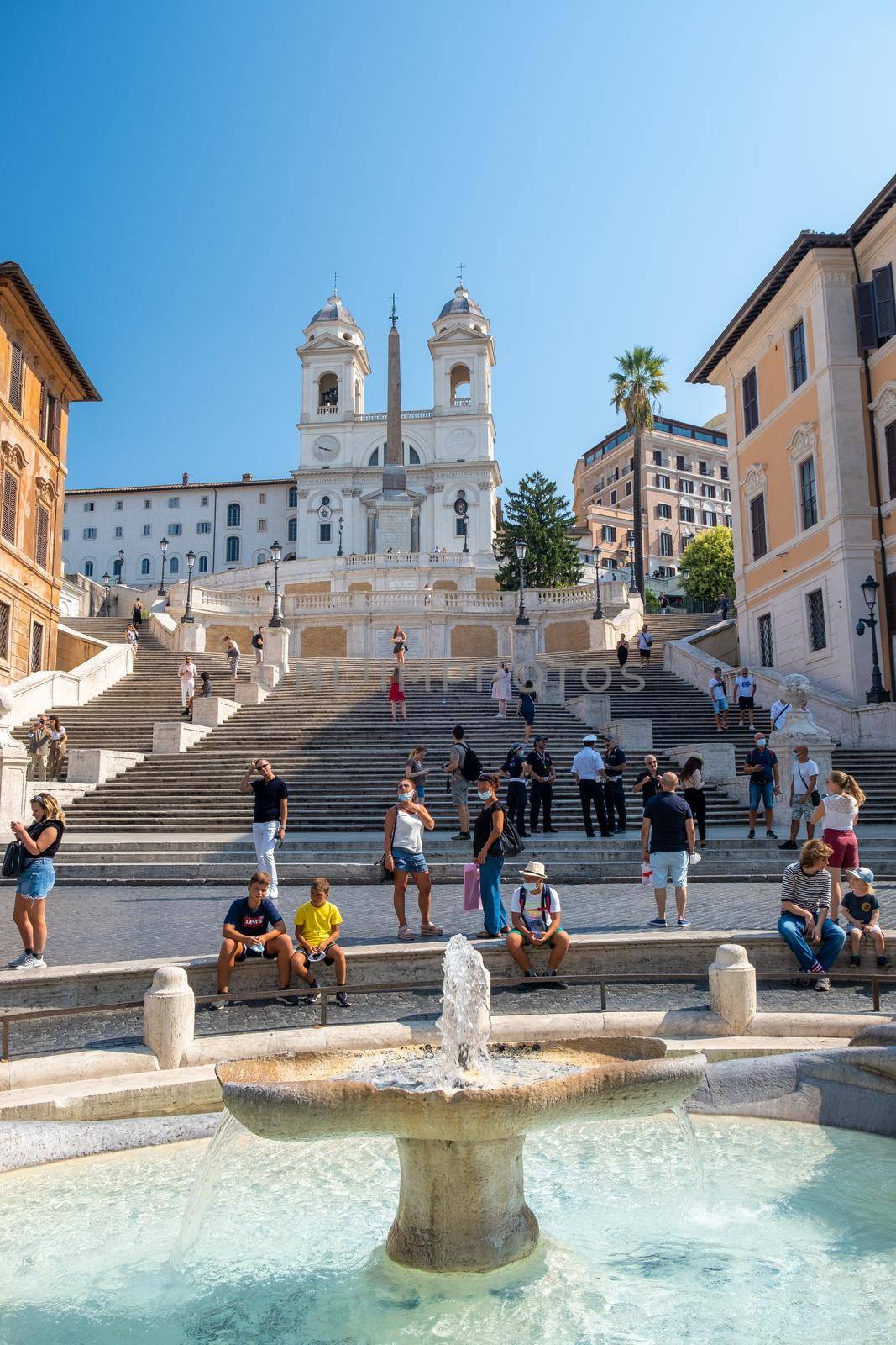 Rome September 2020, The Spanish Steps in Rome, Italy. The famous place is a great example of Roman Baroque Style with people with mouth protection during the covid 19 outbreak Italy Corona virus 