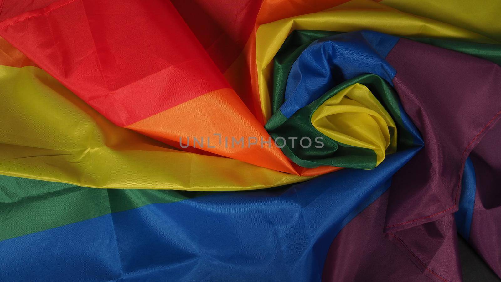 LGBTQ flag or Lesbian Gay Bi sexsual Transgender Queer or homosexsual pride Rainbow flag on black background. Represent hand symbol of freedom, peace, equality and love. LGBTQ concept