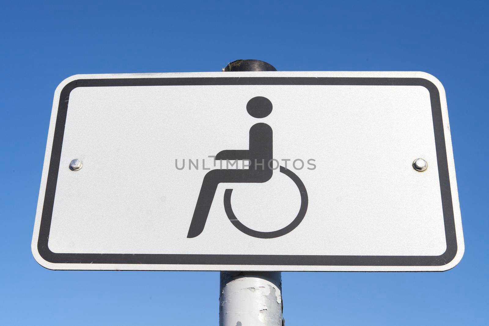 Traffic sign for a parking lot for disabled people