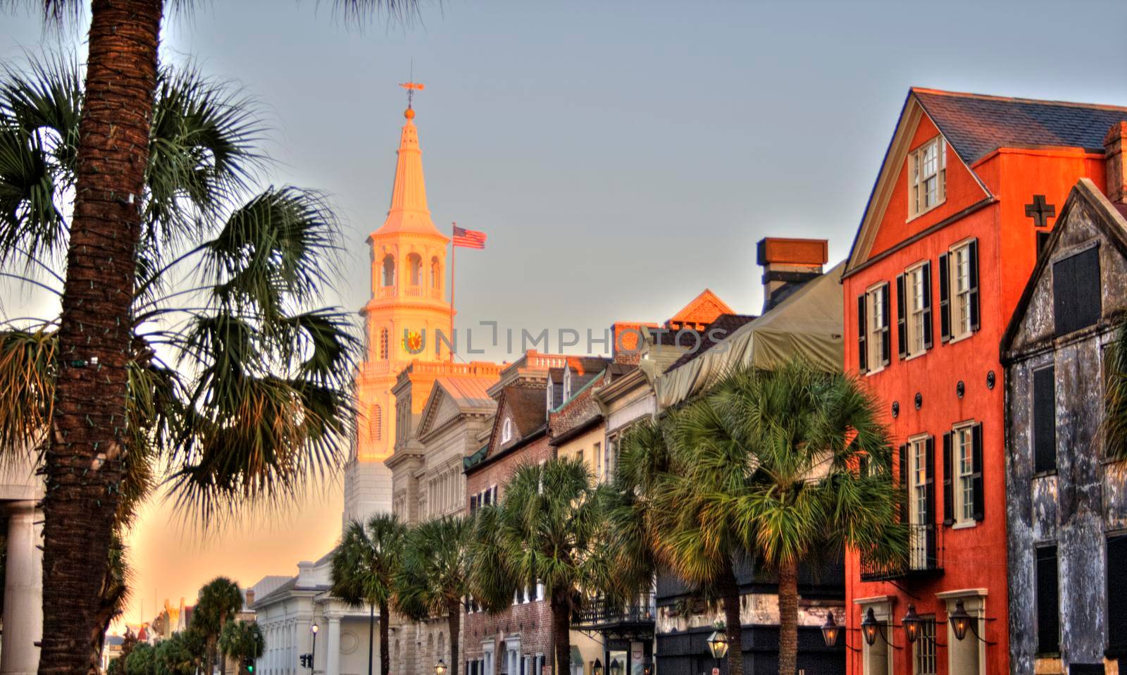 A setting sun makes a church glow in Charleston, South Carolina
