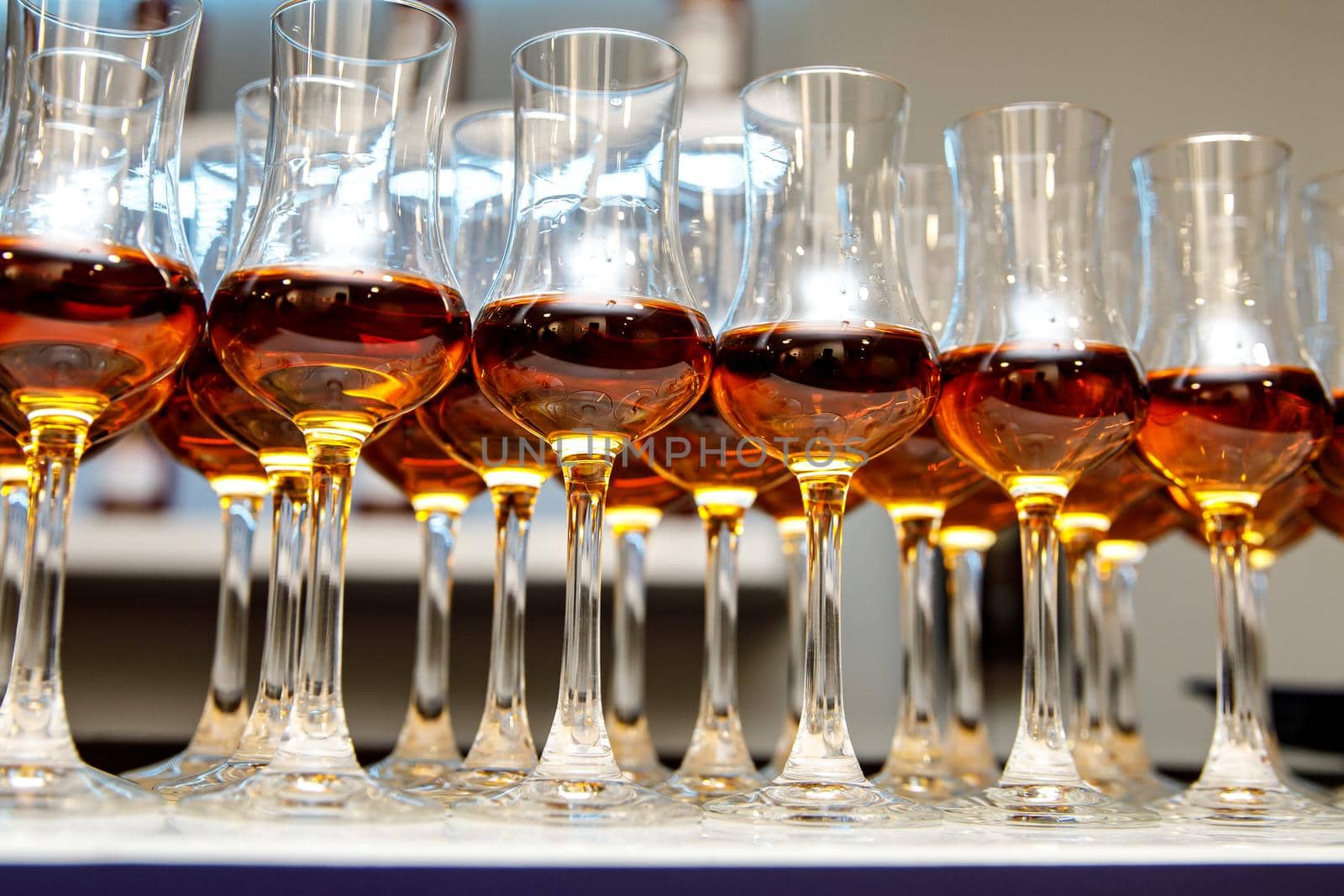 A lot of glasses with cognac