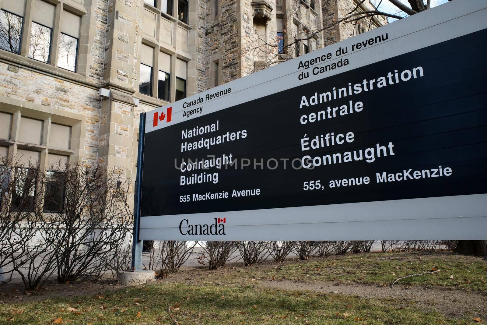 Ottawa, Ontario, Canada - November 18, 2020: A sign for the National Headquarters of the Canada Revenue Agency (CRA) outside the Connaught Building in Ottawa.