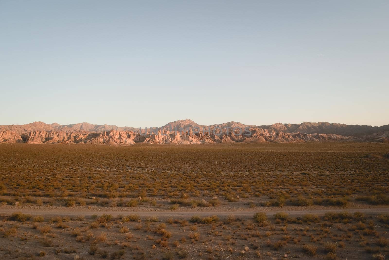 Dirt road across the desert near Uspallata, Mendoza, Argentina.
