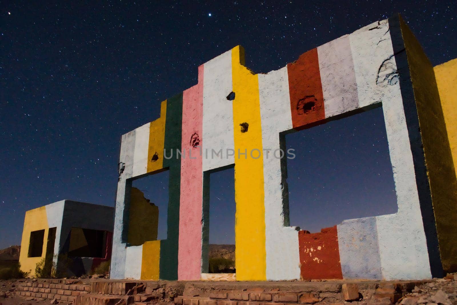 Starry night sky over a derelict house in the middle of the desert near Uspallata, Mendoza, Argentina. by hernan_hyper