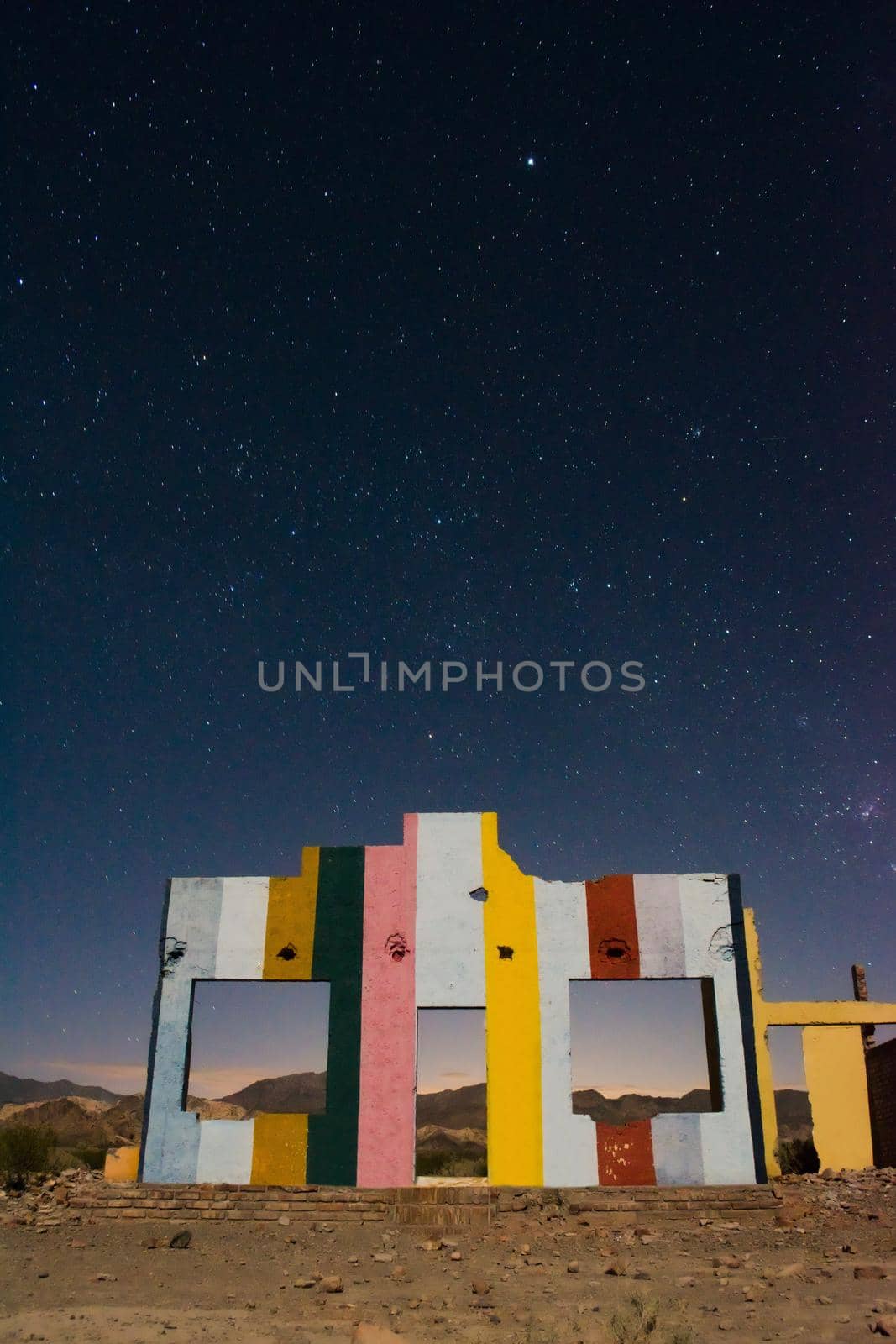 Starry night sky over a derelict house in the middle of the desert near Uspallata, Mendoza, Argentina. by hernan_hyper