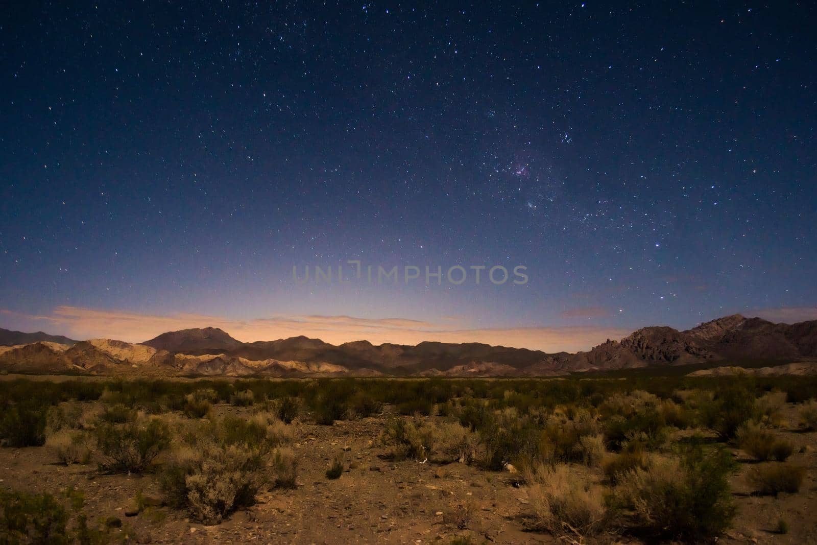 Starry night sky above the desert near Uspallata, Mendoza, Argentina. by hernan_hyper