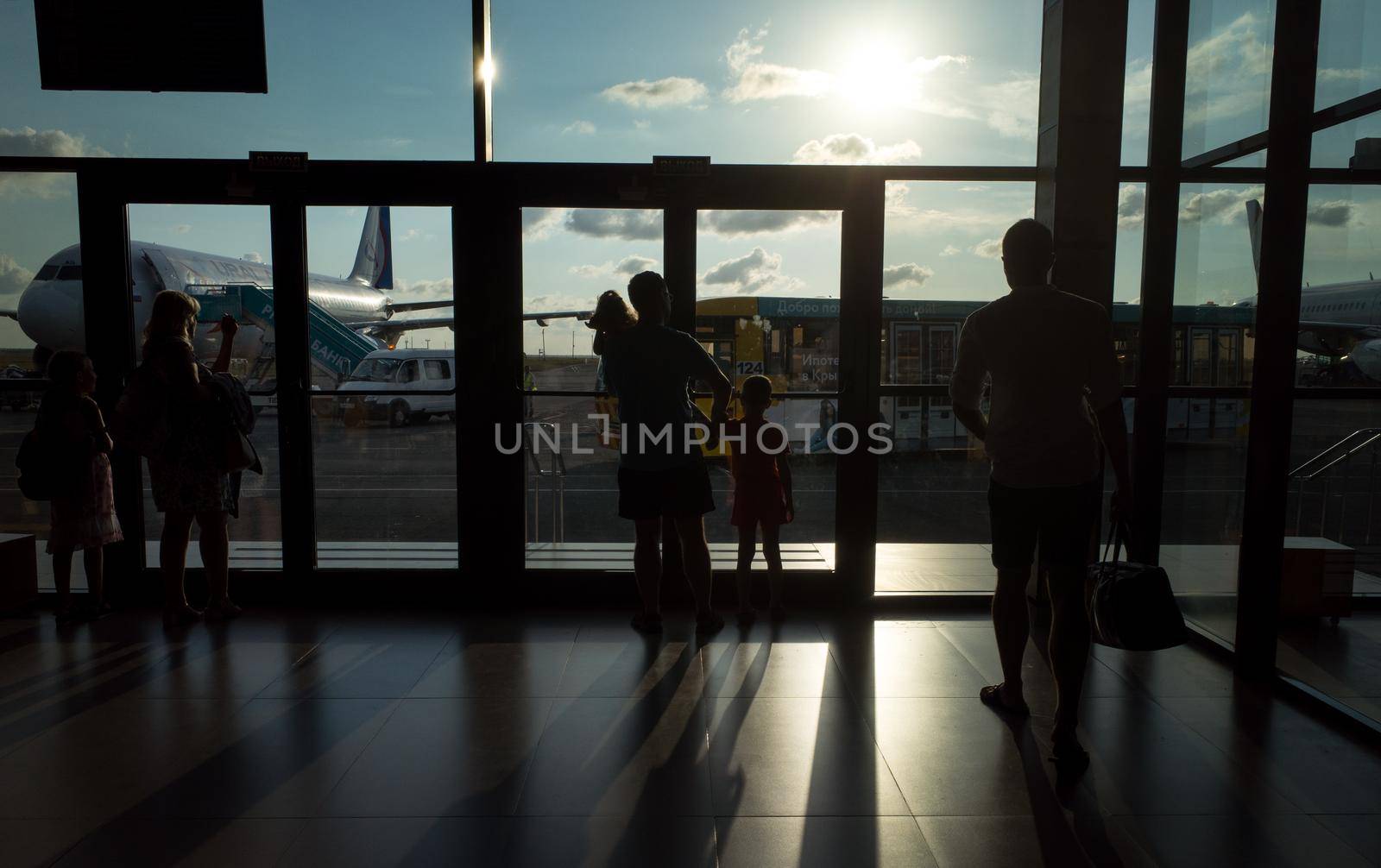 SIMFEROPOL, RUSSIA, JULY 28, 2017 Silhouettes of passengers at the International Airport of Simferopol