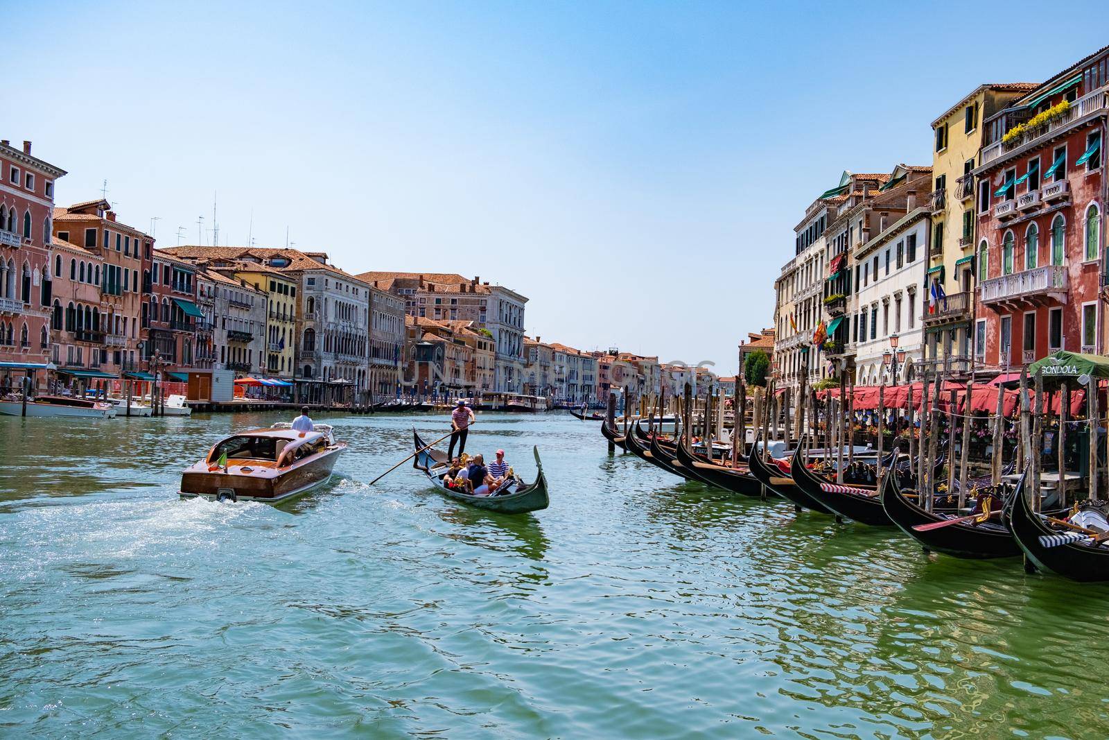 Venice Italy June 2020, Beautiful venetian street in summer day, Italy Venice with gondola by fokkebok