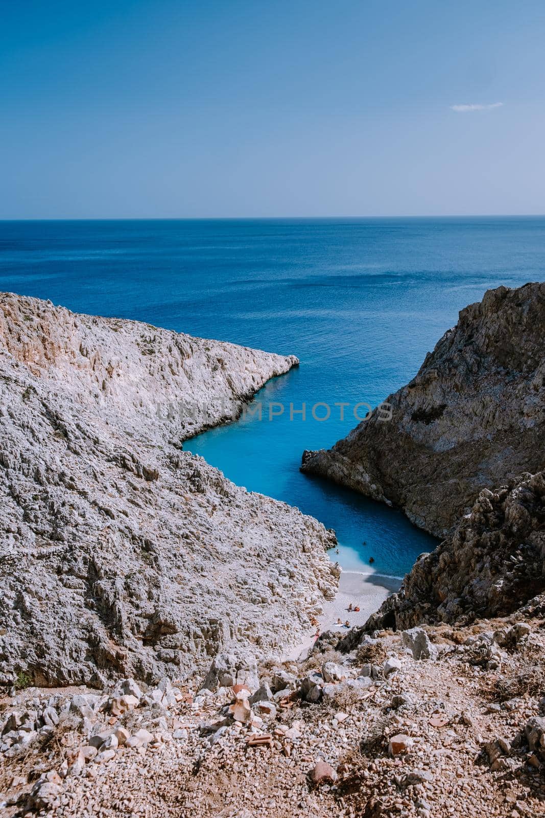 Crete Greece Seitan Limania beach with huge cliff by the blue ocean of the Island of Crete in Greece, Seitan limania beach on Crete, Greece by fokkebok