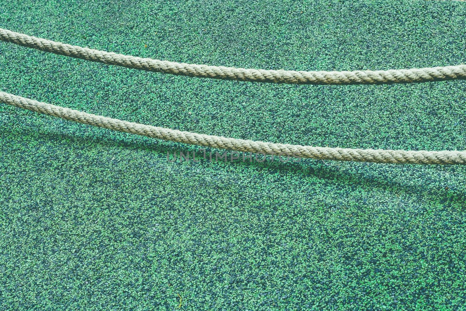 Abstract background green floor and two ropes for topic or copy space.