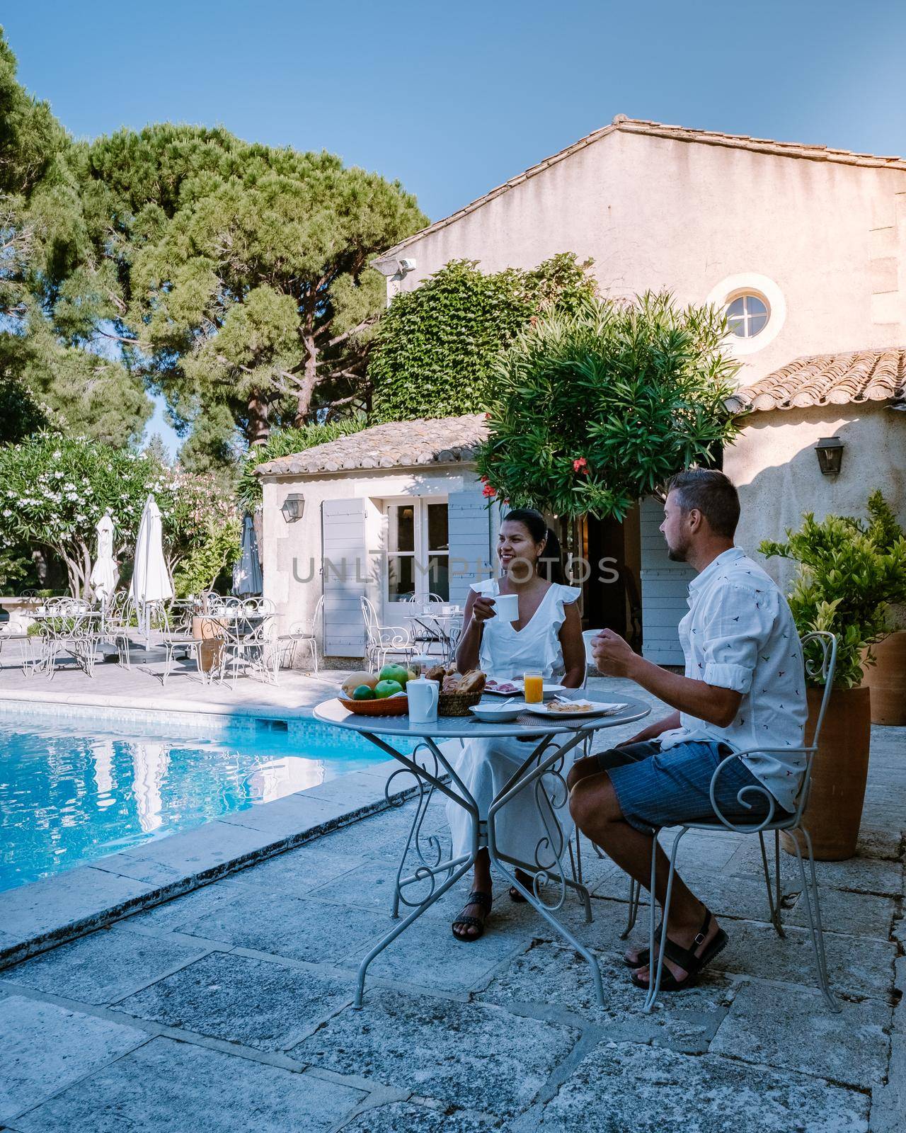 breakfast by the pool of an luxury hotel in the Provence France by fokkebok