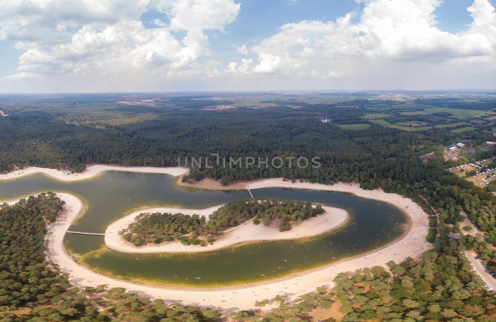 A lake situated in the Netherlands, Utrecht, called Henschotermeer. by drone aerial utrechtse heuvelrug, henschotermeer, lake in holland. Europe