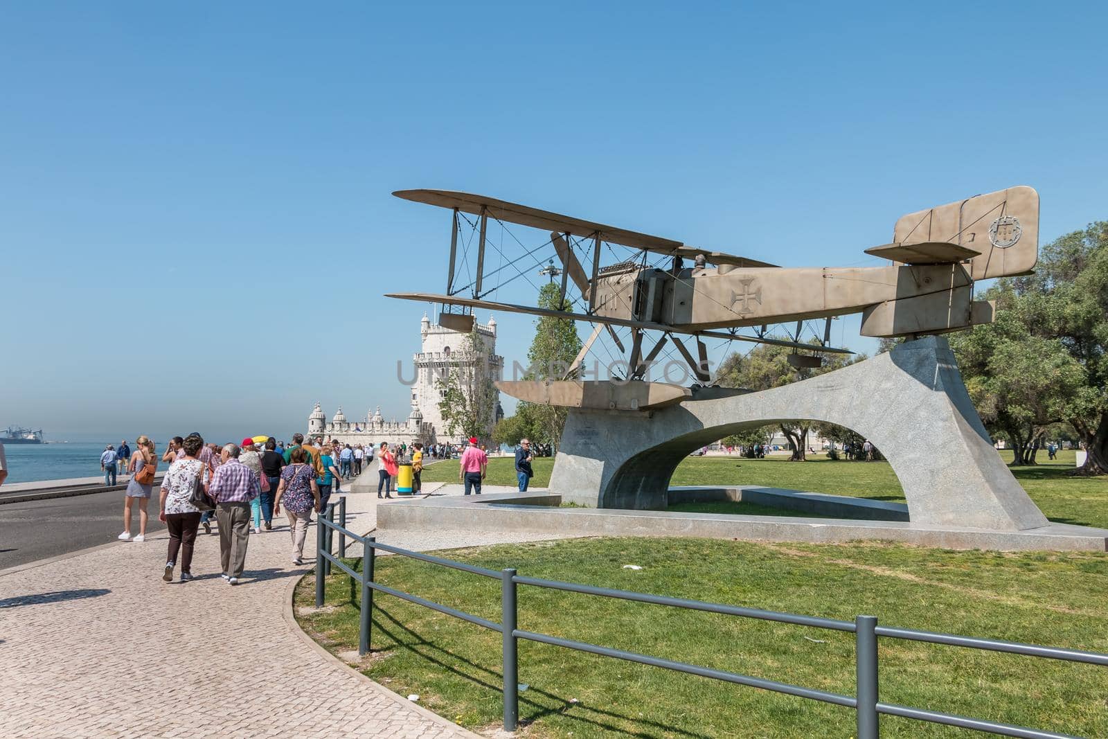 Lisbon, Portugal - May 7, 2018: Tourists walking next to Fairey III-D aircraft, Replica of the first aircraft that made the first crossing of the South Atlantic by Gago Coutinho and Sacadura Cabral