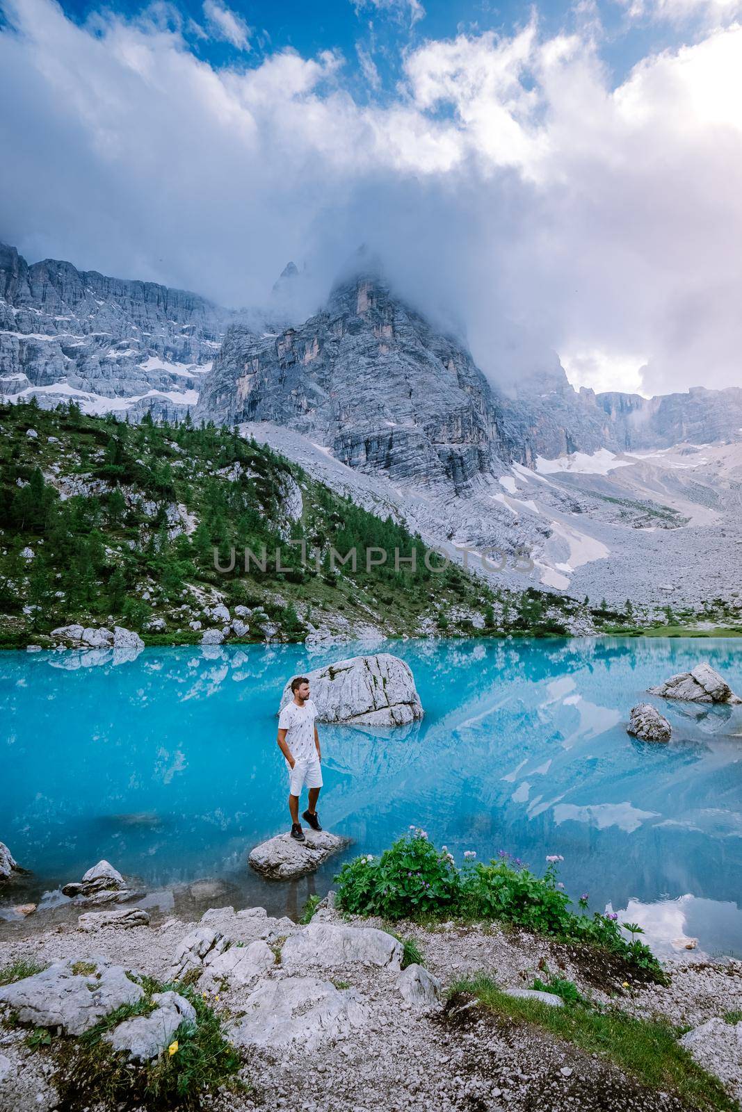 Blue green lake in the Italian Dolomites,Beautiful Lake Sorapis Lago di Sorapis in Dolomites, popular travel destination in Italy by fokkebok