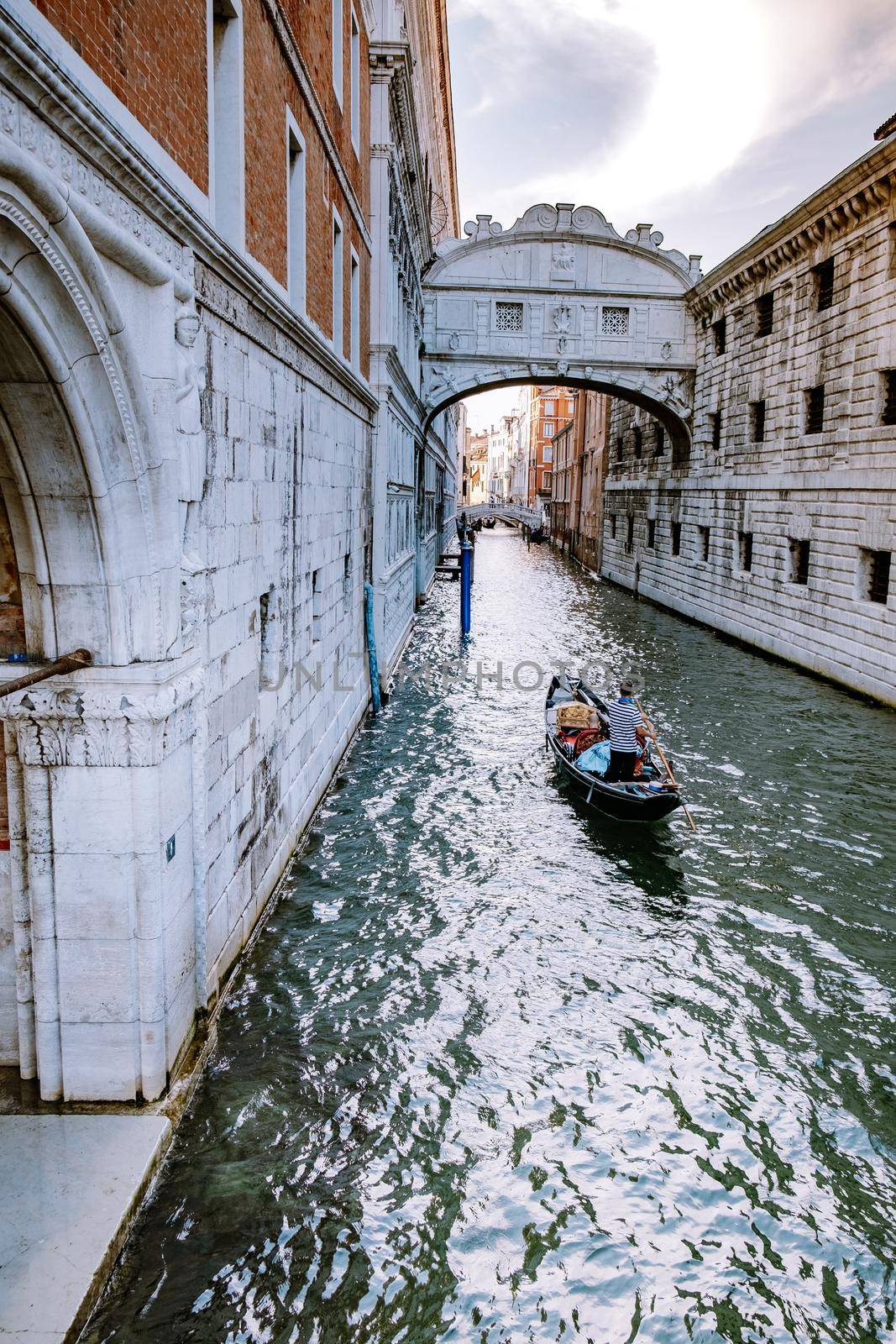 Beautiful venetian street in summer day, Italy. Venice Europe