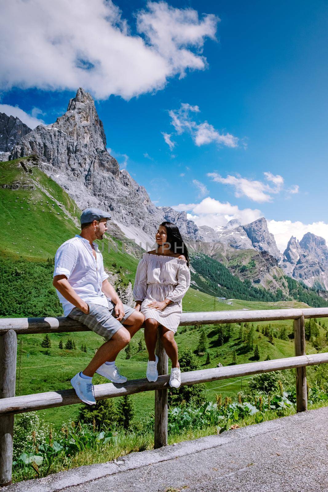 Pale di San Martino from Baita Segantini - Passo Rolle italy,Couple visit the italian Alps, View of Cimon della Pala, the best-know peak of the Pale di San Martino Group in the Dolomites, northern Italy by fokkebok