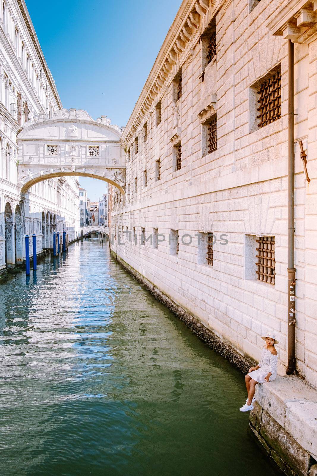 woman on city trip in Venice, Beautiful venetian street in summer day, Italy Venice by fokkebok