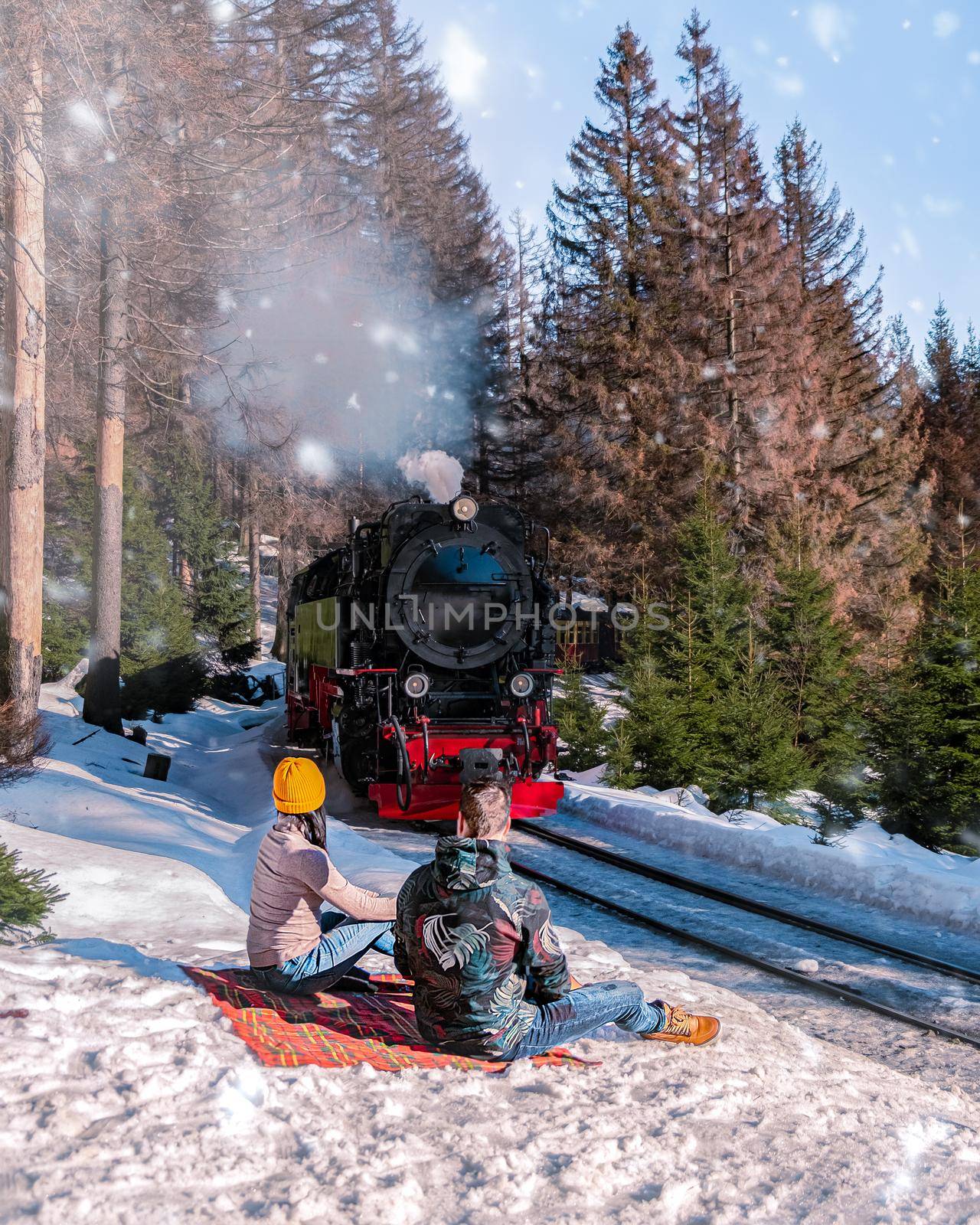 Harz national park Germany, Steam train on the way to Brocken through winter landscape, Famous steam train throught the winter mountain . Brocken, Harz National Park Mountains in Germany by fokkebok