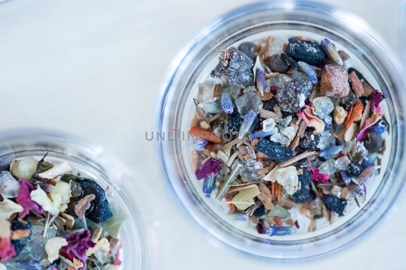 Close up picture of dried incense in a glass bowl