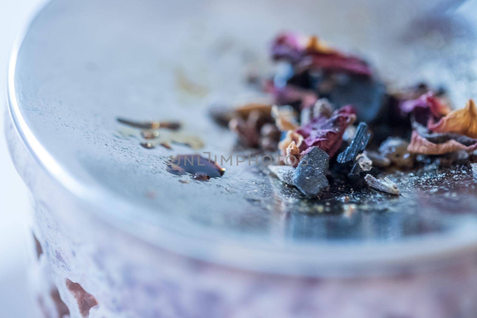 Close up picture of dried incense in a glass bowl