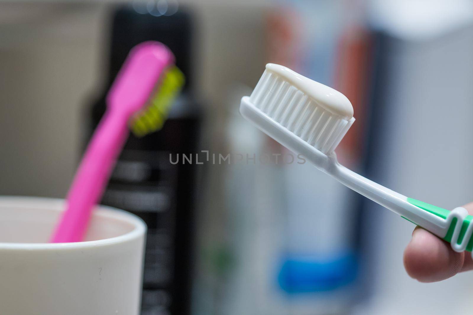 Colorful toothbrush in the bathroom, morning routine