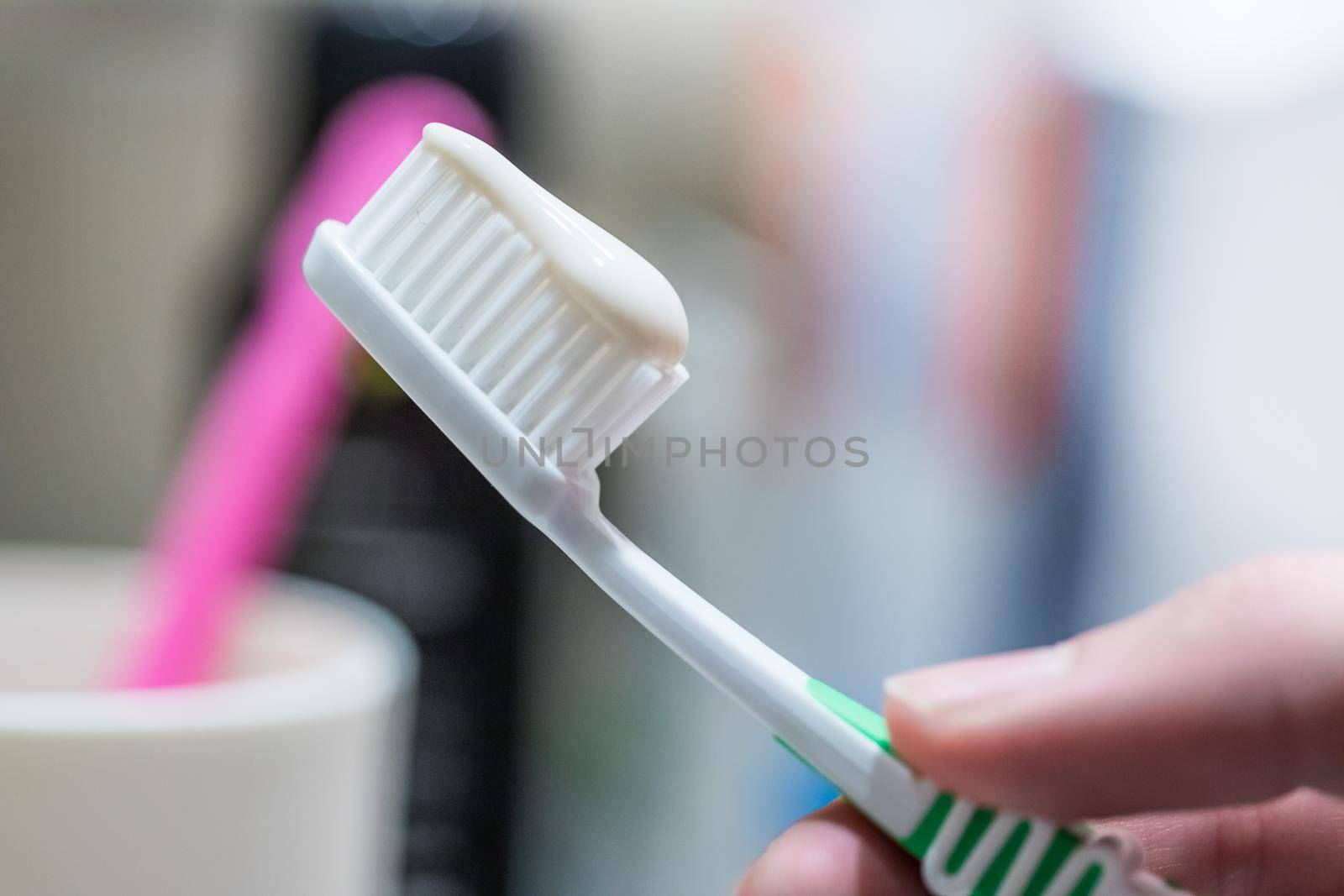 Colorful toothbrush in the bathroom, morning routine