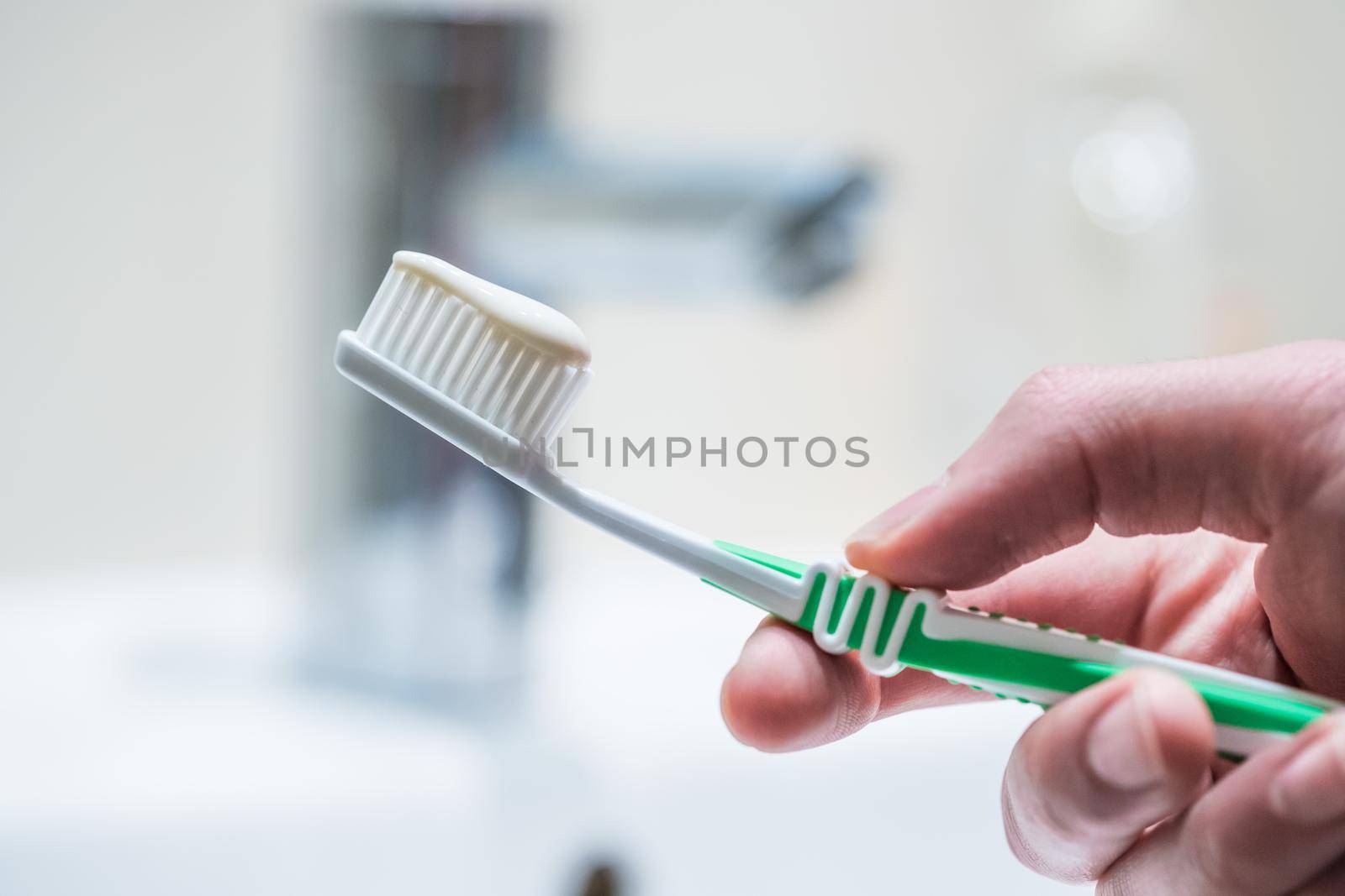 Colorful toothbrush in the bathroom, morning routine