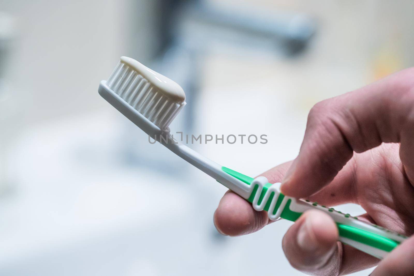 Colorful toothbrush in the bathroom, morning routine