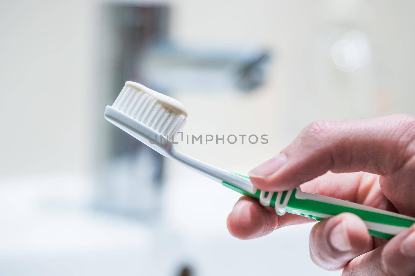 Colorful toothbrush in the bathroom, morning routine