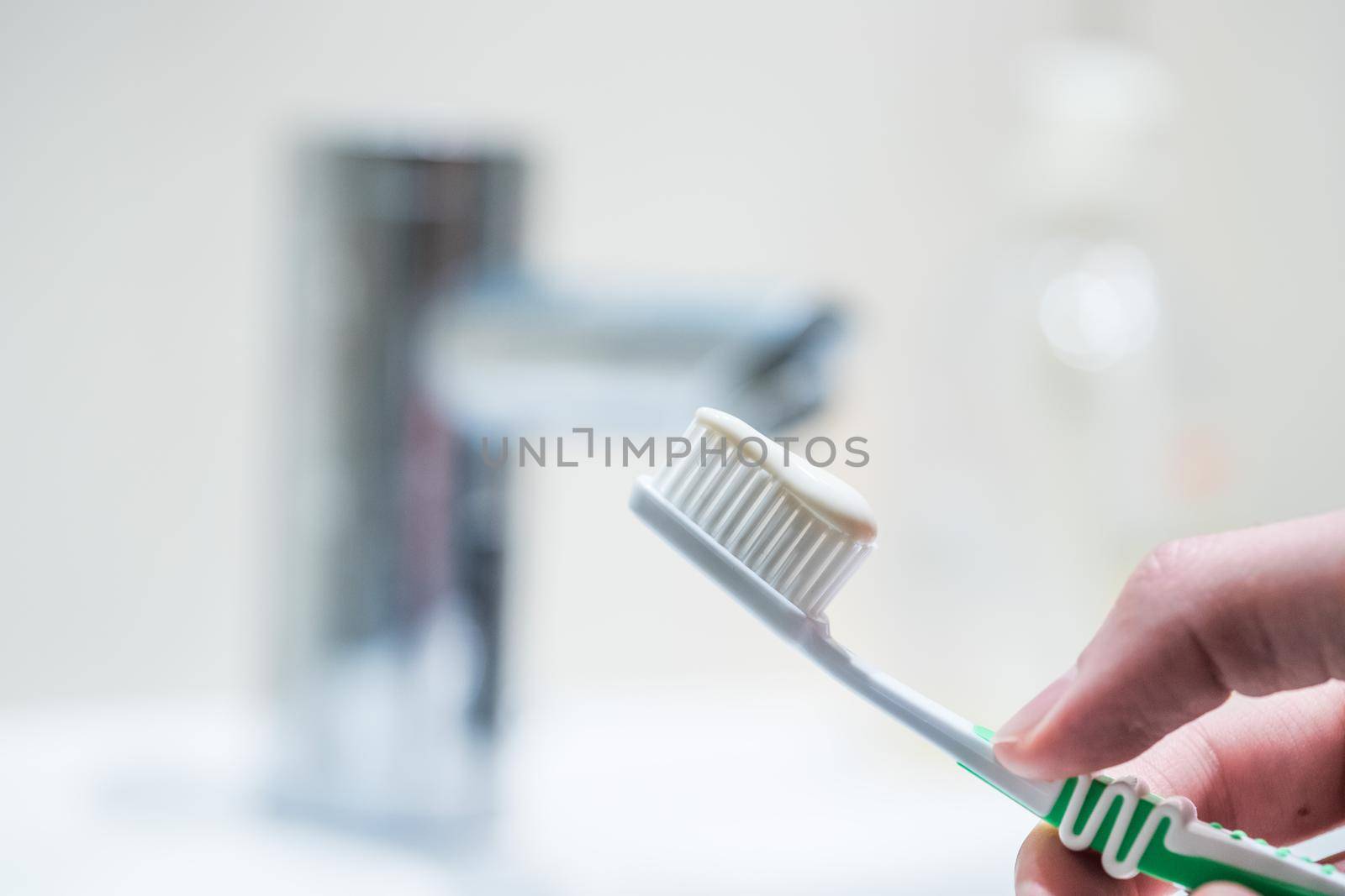 Colorful toothbrush in the bathroom, morning routine