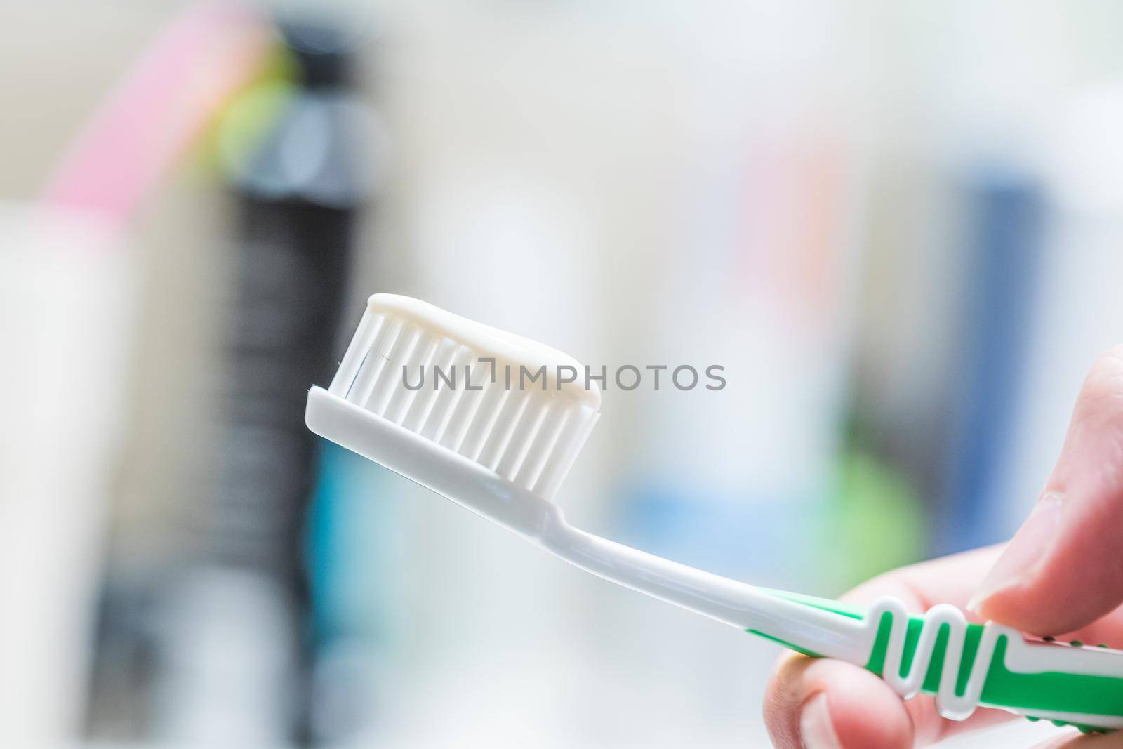 Colorful toothbrush in the bathroom, morning routine