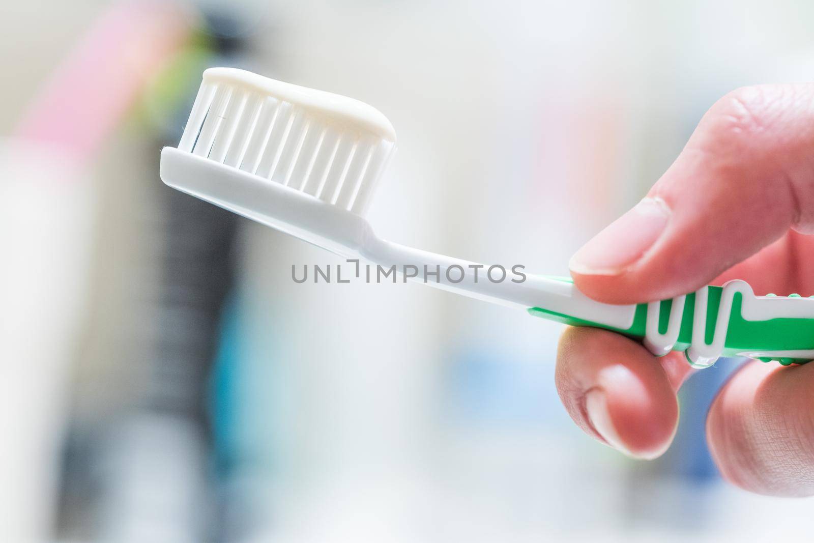 Colorful toothbrush in the bathroom, morning routine