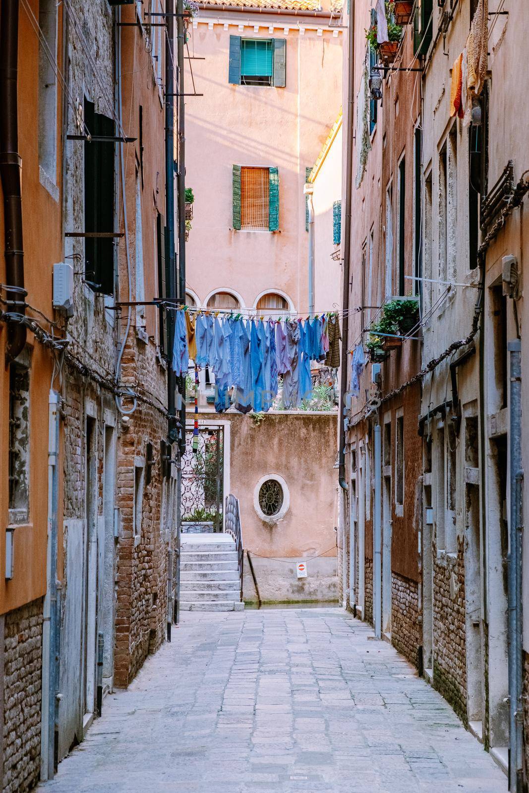 Beautiful venetian street in summer day, Italy Venice by fokkebok