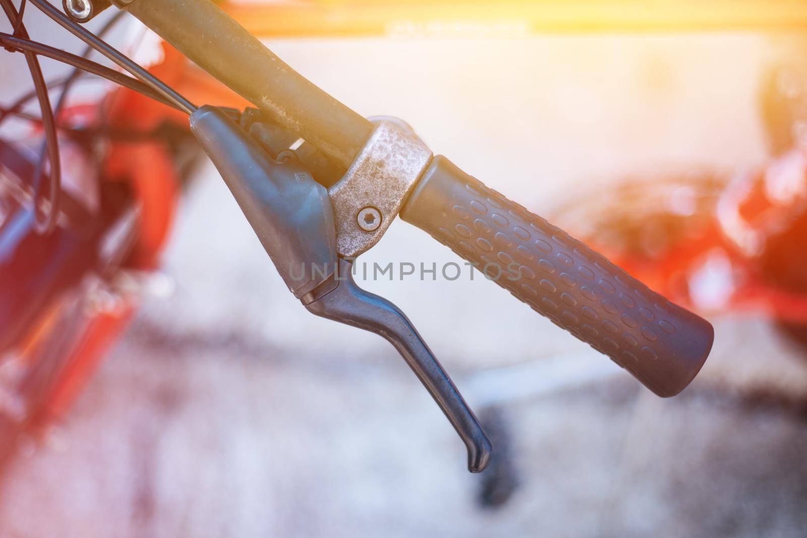 Bicycle handlebar and breaks, bike repair, blurred background by Daxenbichler