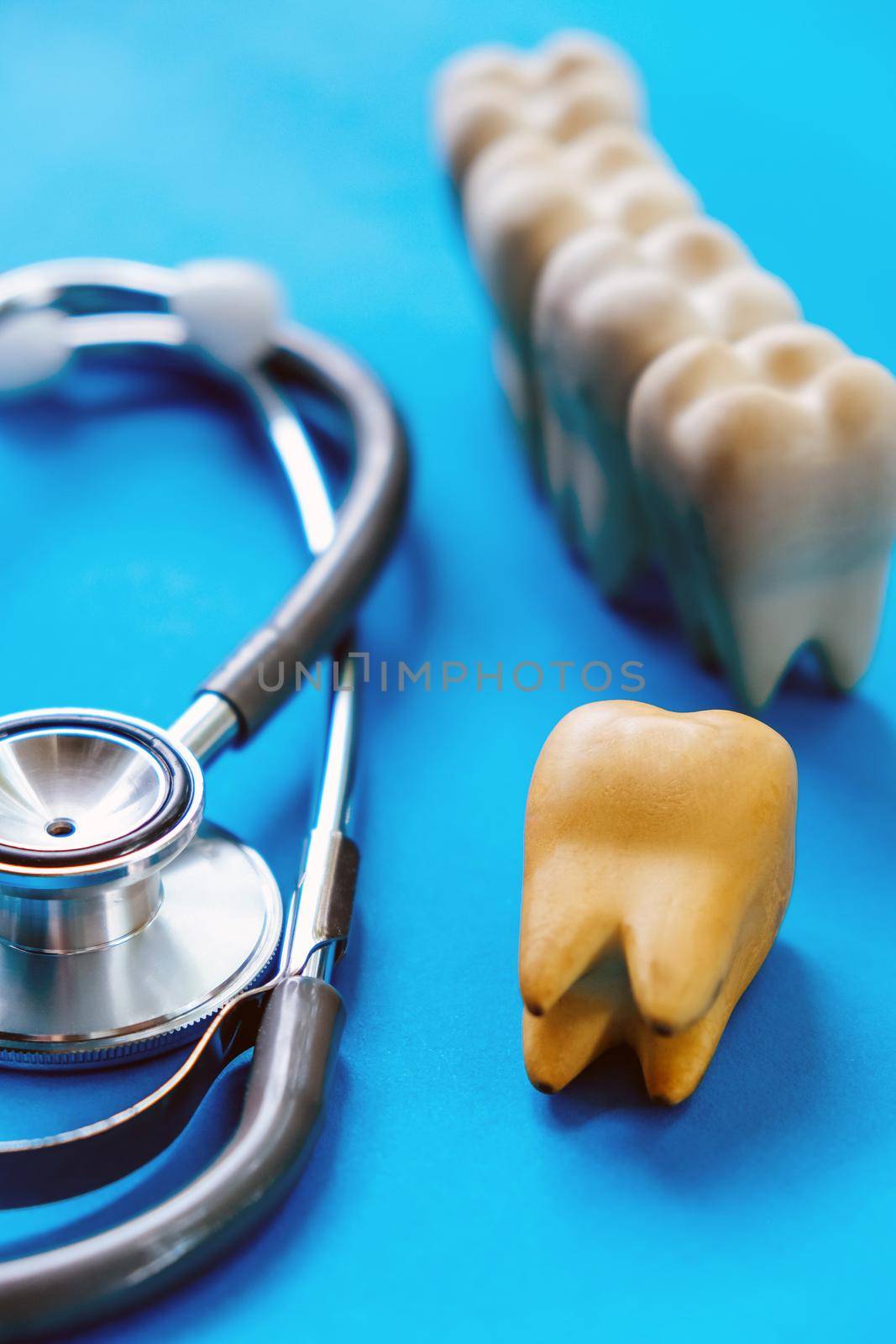 Dental model and dental equipment on blue background, concept image of dental background. dental hygiene background