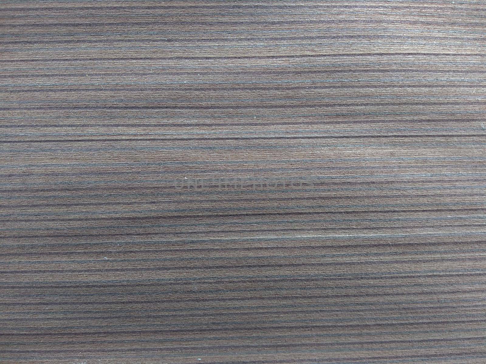 Natural european wengen wood texture background. veneer surface for interior and exterior manufacturers use.