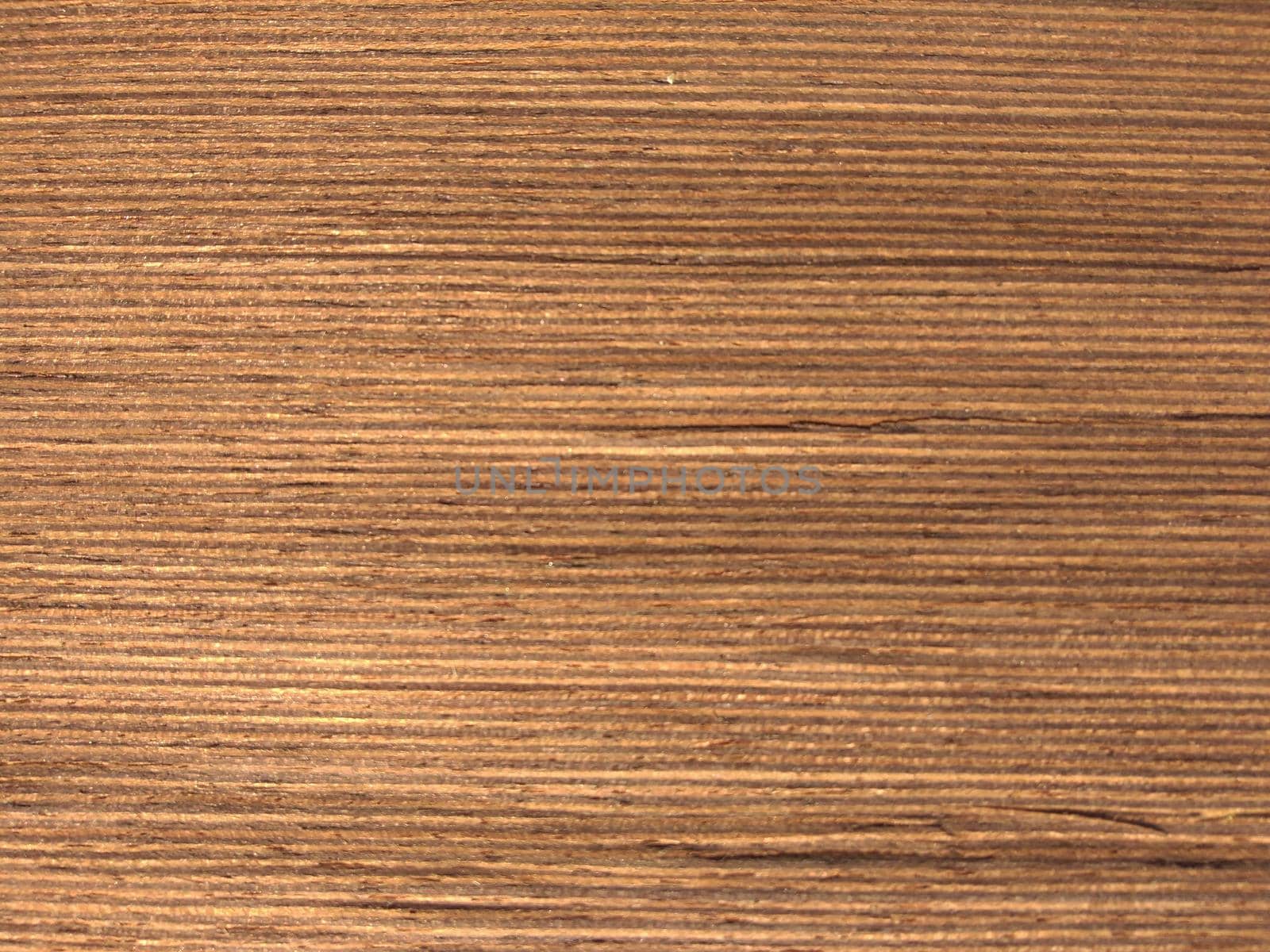 Natural red wengen wood texture background. veneer surface for interior and exterior manufacturers use.