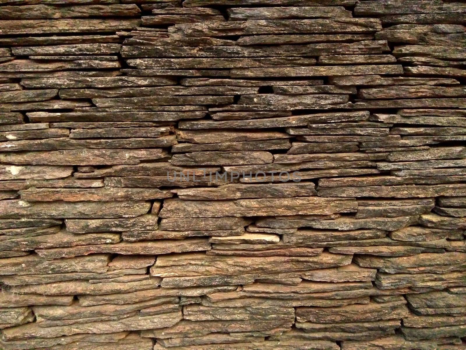 Architecture and interior image of Natural pieces of stone wall.