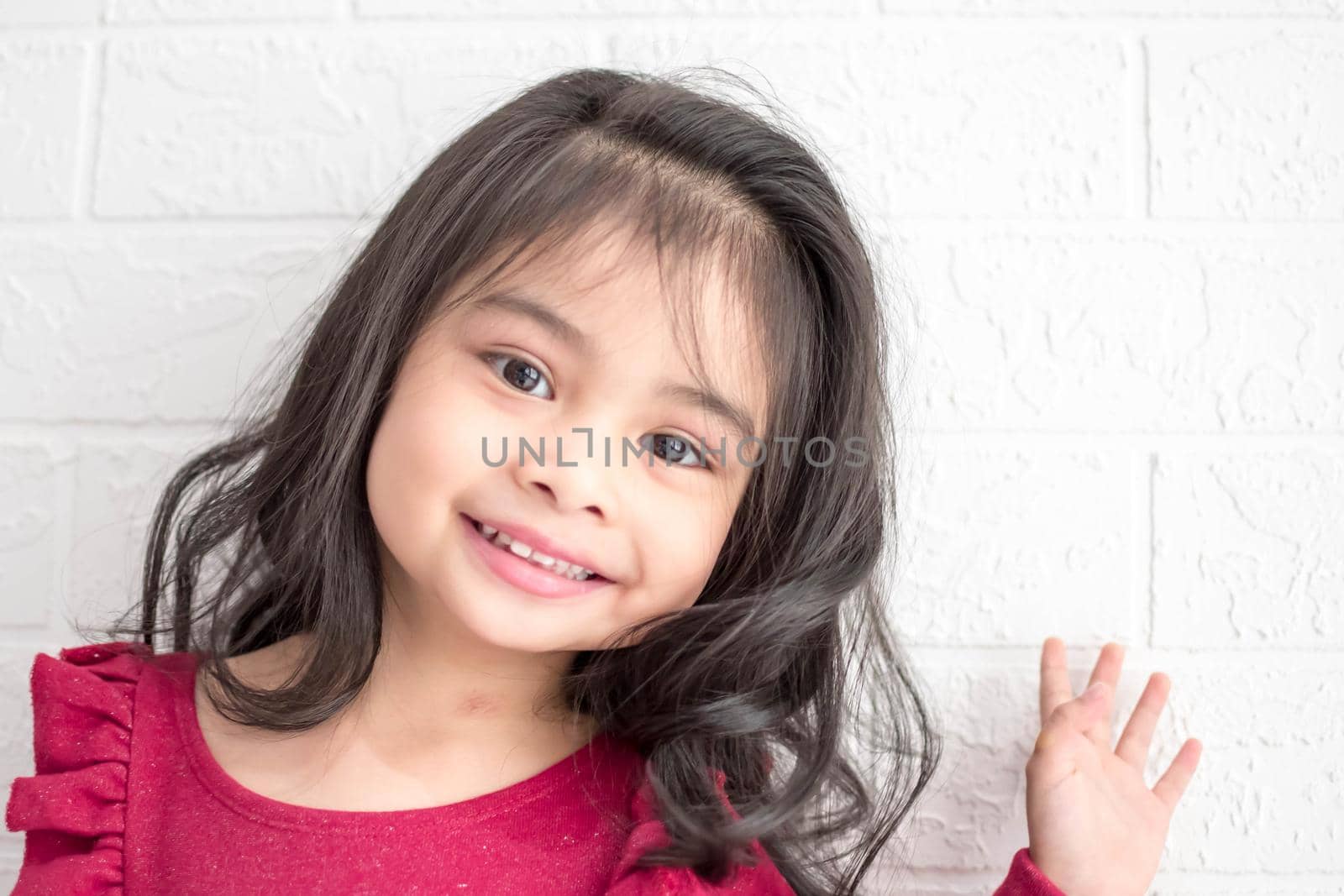 Fashion model and beauty look. Stylish girl with pretty face on grey background. Hairdresser, skincare, casual style. Beauty and kid fashion with healthy hair. Little girl with long hair. by billroque