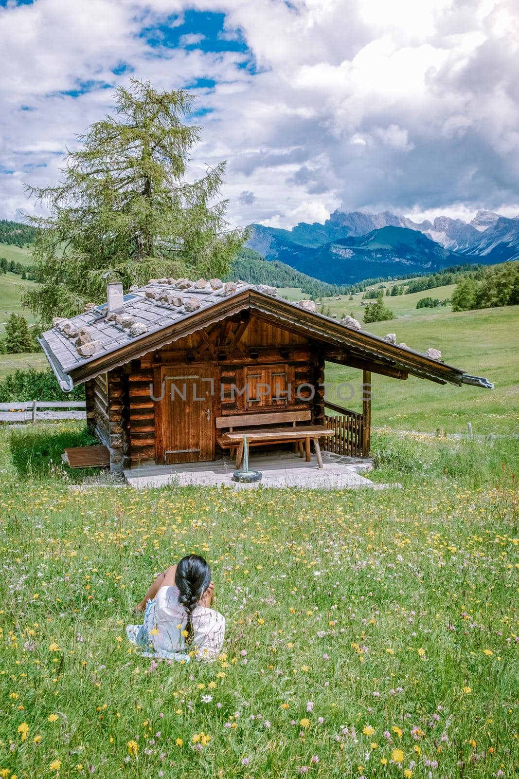  woman on vacation in the Dolomites Italy,Alpe di Siusi - Seiser AlmSouth Tyrol, Italy. Europe