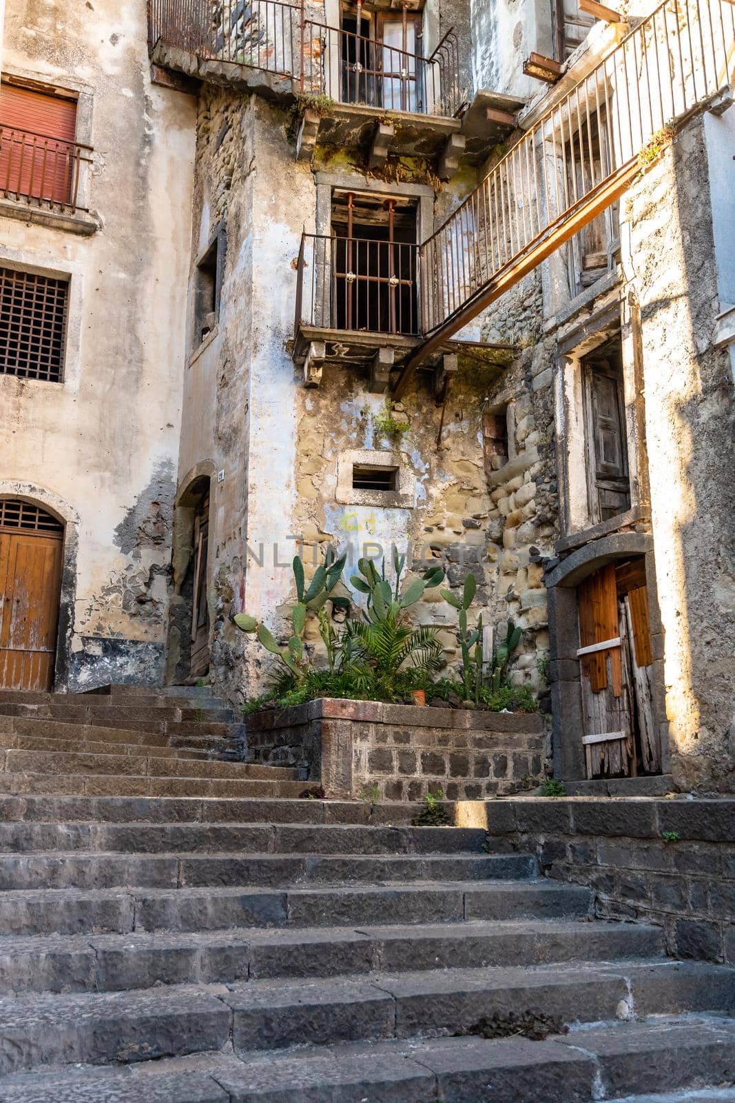 Old abandoned houses in a staircase road, Castiglione di Sicilia, ITA by mauricallari