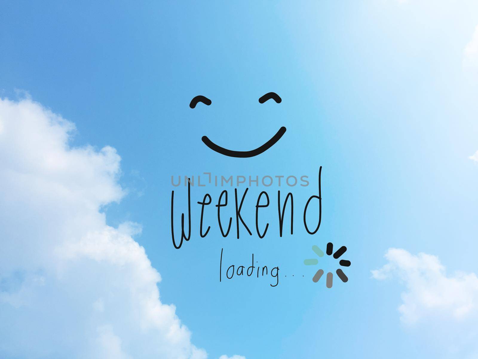 Weekend loading word and smile face on blue sky by Yoopho