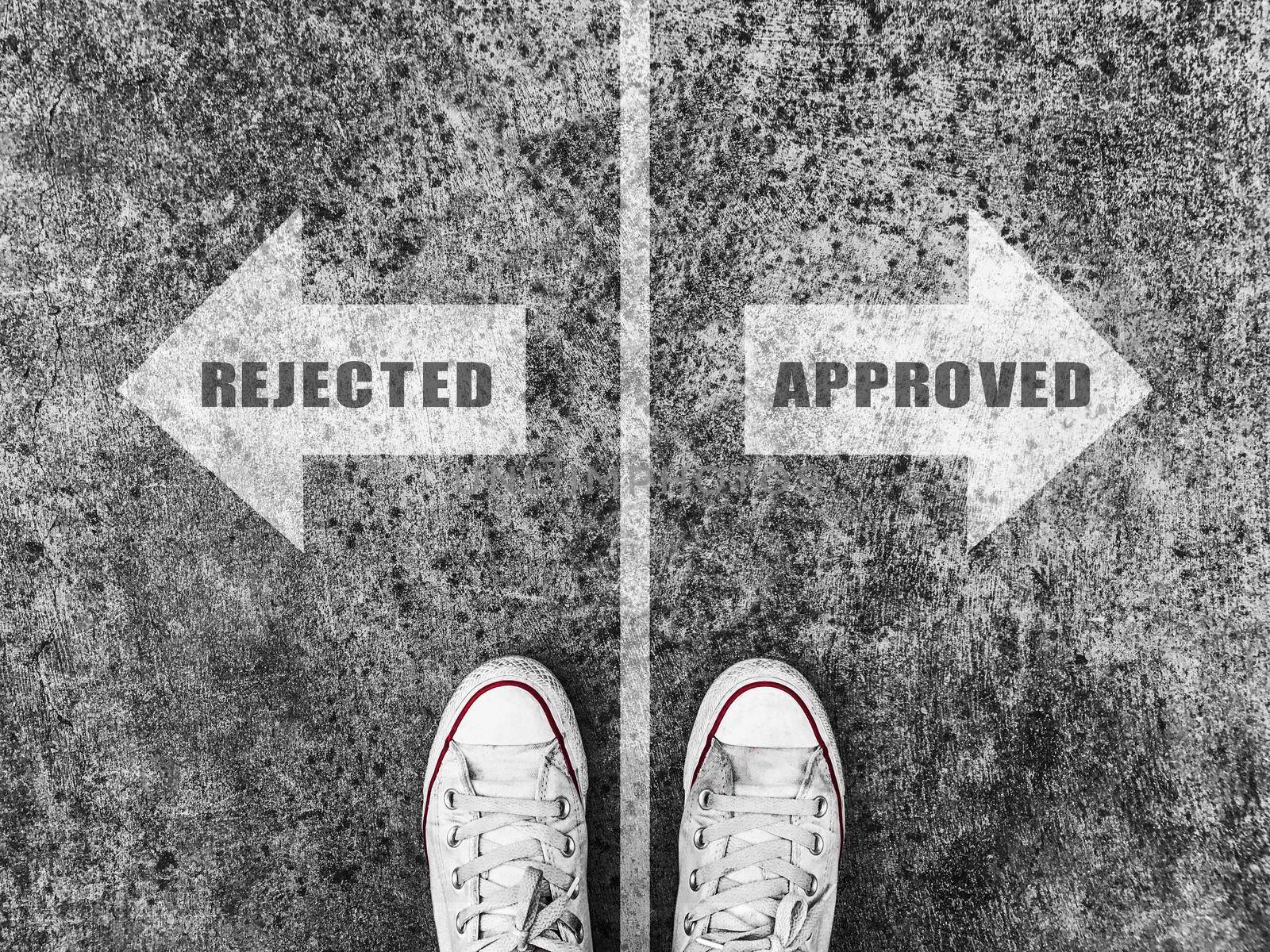 Rejected and approved arrow on street and sneaker shoe background, business concept