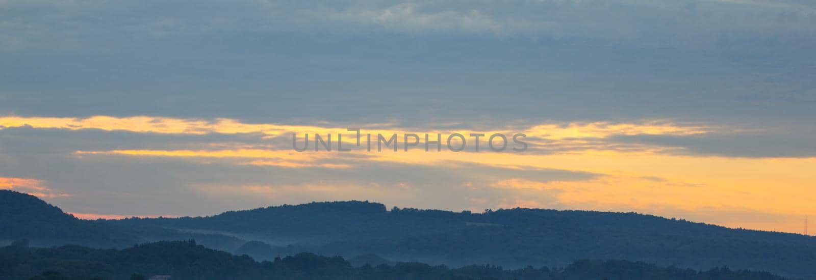 Sunset on small hills in western New York state