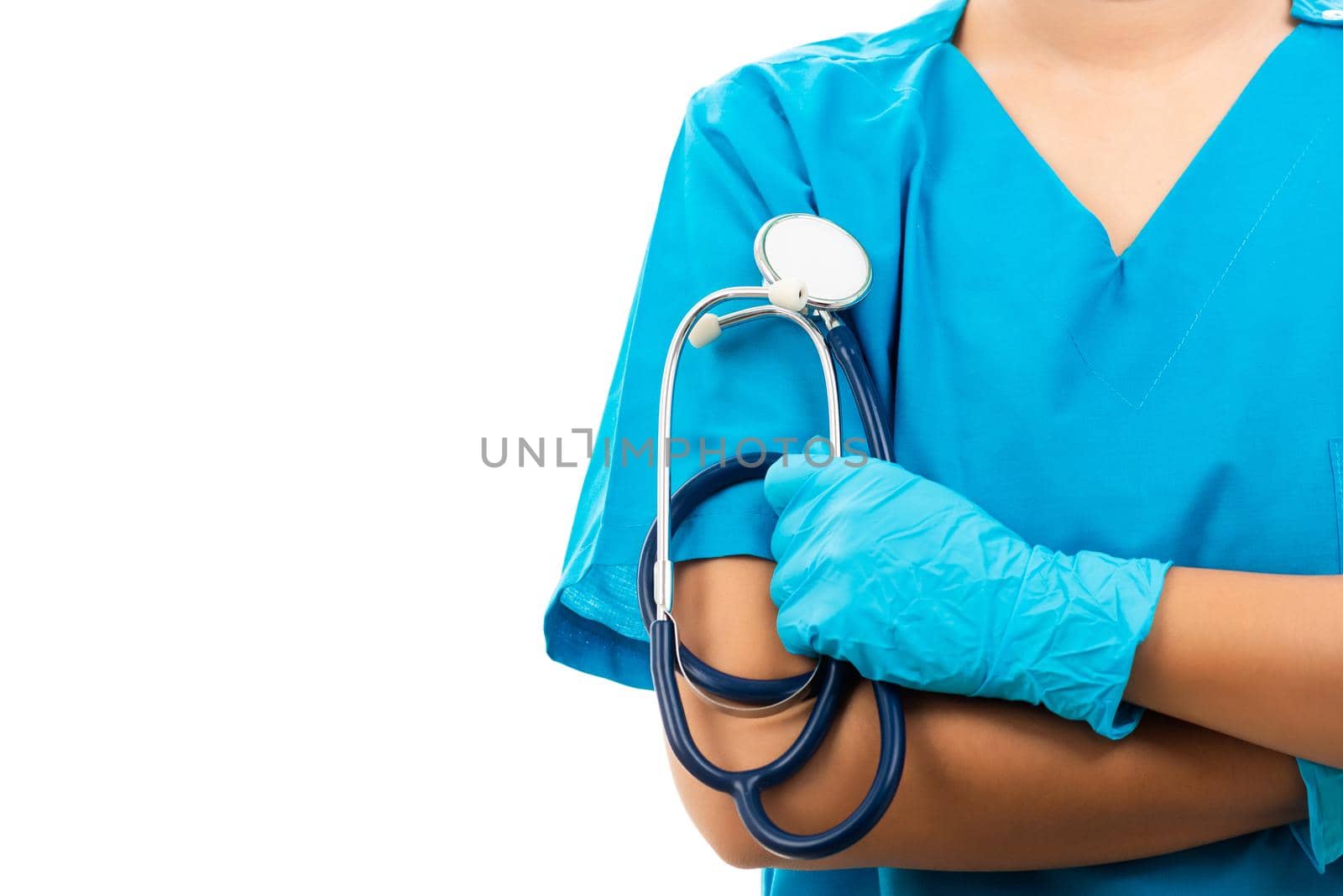 Female nurse with stethoscope puts on rubber gloves and wearing medical face mask, woman doctor in blue uniform crossed arms, studio shot isolated on over white background, medical health concept